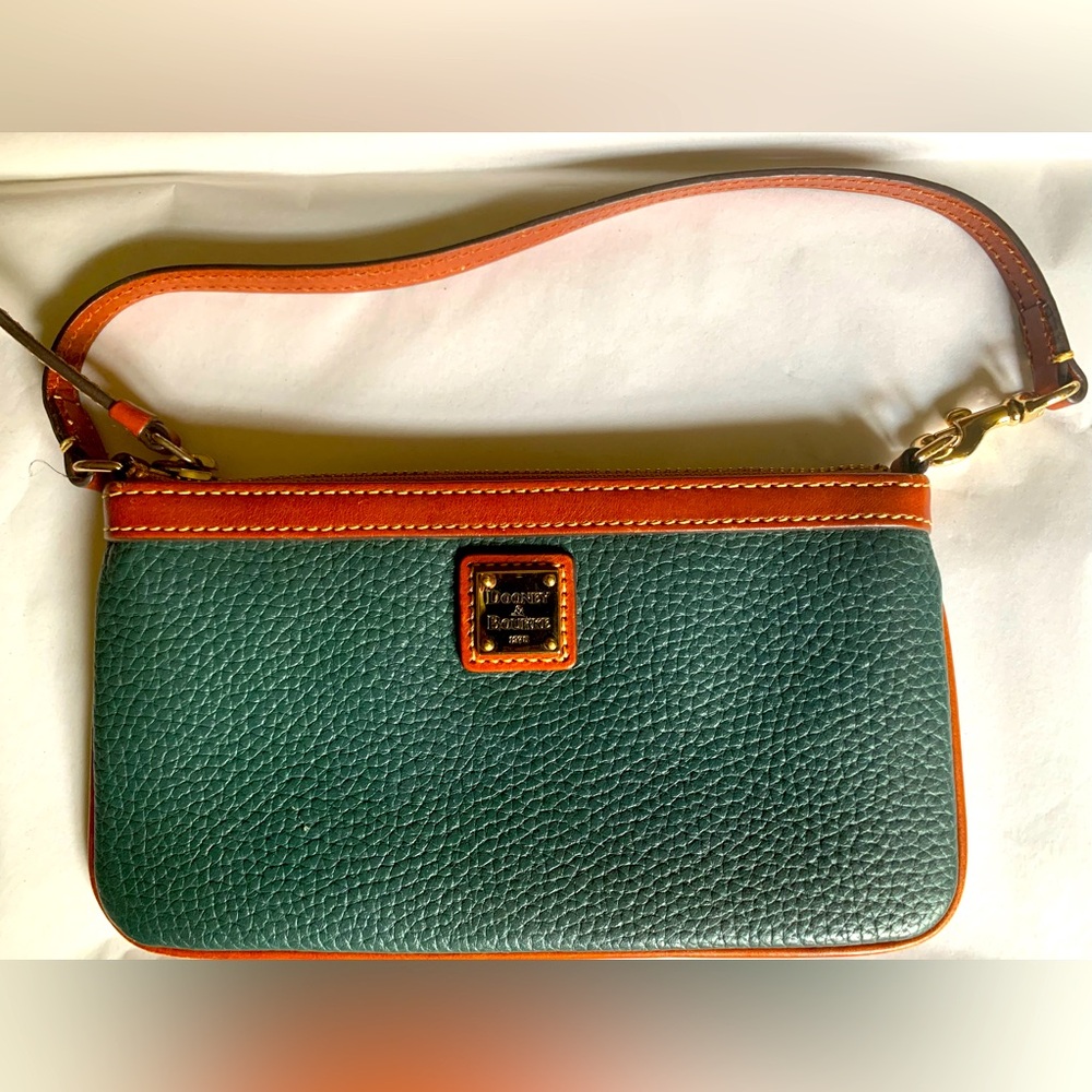 Dooney & Bourke green leather wristlet.